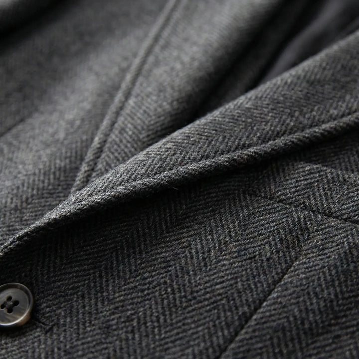 Stylish men's herringbone patterned 3-piece suit. Tailored fit for a sophisticated, classic formal look.