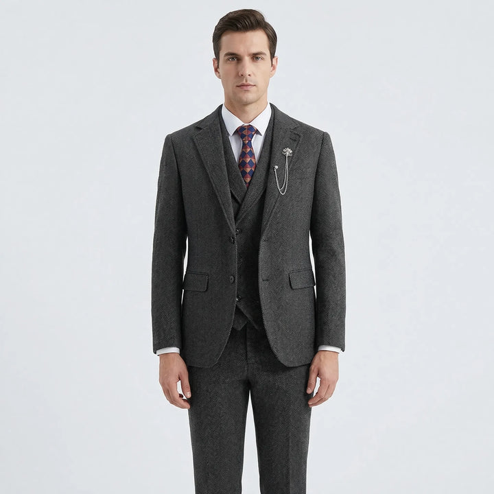 Elegant men's tailored 3-piece herringbone suit, perfect for formal occasions & business attire. Classic style.