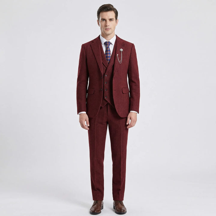 Complete men's formal 3-piece herringbone suit: jacket, vest, trousers for a sharp, tailored look.