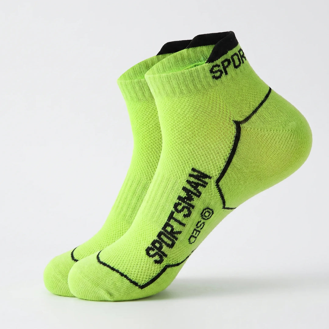 Men's breathable athletic socks shown. Low-cut ankle style, 6-pack for versatile sport and gym use.