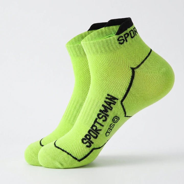 Men's breathable athletic socks shown. Low-cut ankle style, 6-pack for versatile sport and gym use.
