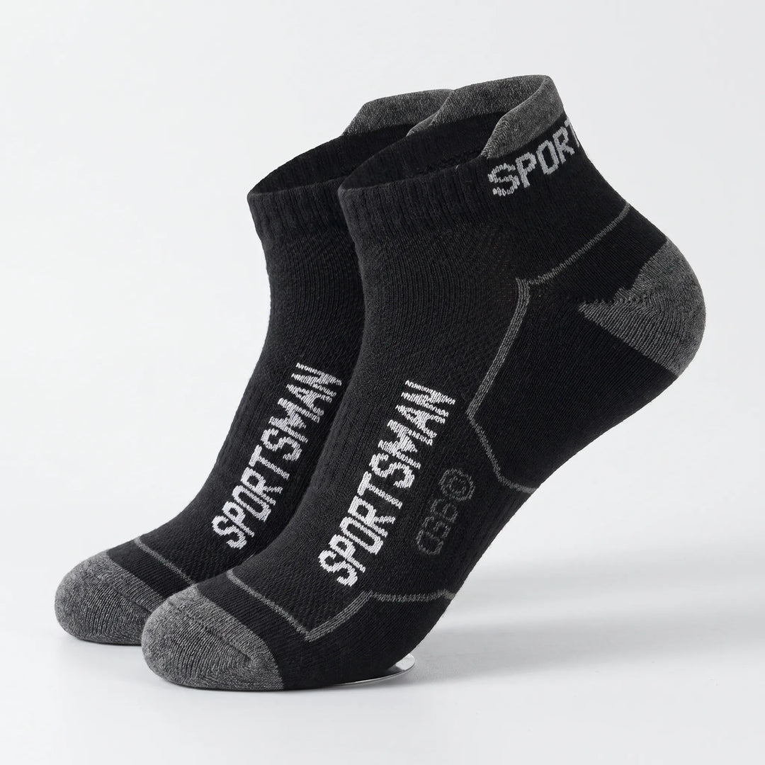 View of folded men's breathable ankle socks. 6-pack low-cut design, perfect for sports & gym.