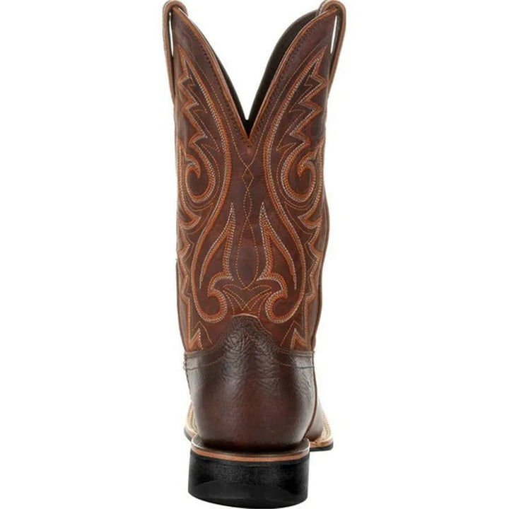 Men's square toe Western boots with totem pattern. Comfortable mid-calf slip-on design for authentic rugged style.