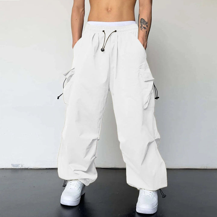 Men's baggy cargo parachute pants, perfect for Y2K streetwear & hip hop style. Loose fit & comfortable.
