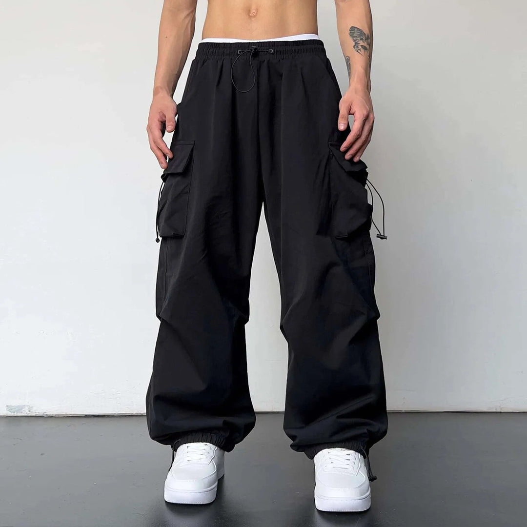 Men's casual wide leg utility cargo parachute pants. Comfortable loose fit for street style & Y2K fashion.