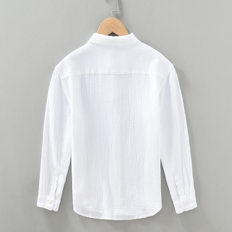 White men's lightweight button-up shirt. Breathable & relaxed fit, great for summer everyday style.