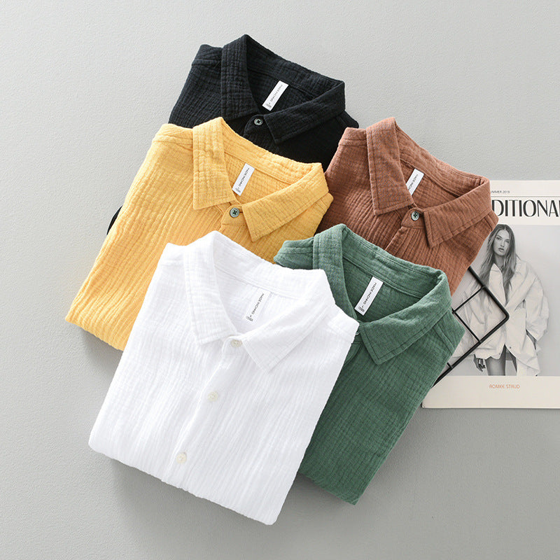 Breathable men's lightweight button-up shirt in green. Perfect for summer casual and warm weather.