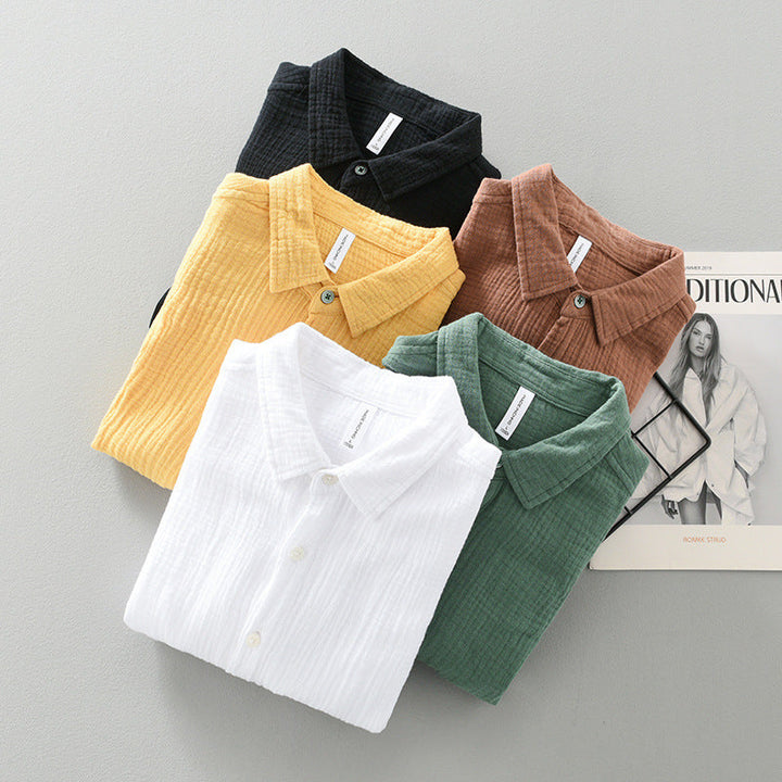 Breathable men's lightweight button-up shirt in green. Perfect for summer casual and warm weather.