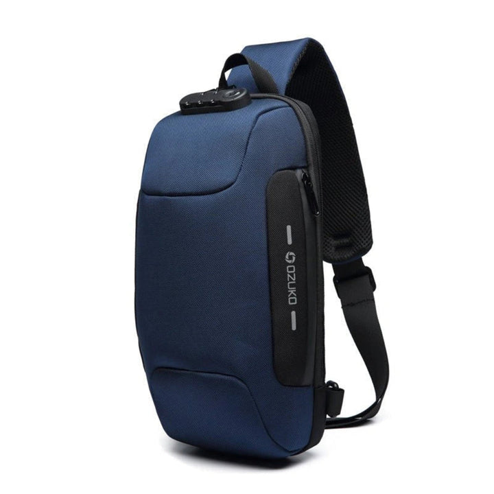 Stylish navy men's travel sling bag with secure hidden pockets and external USB charging functionality.