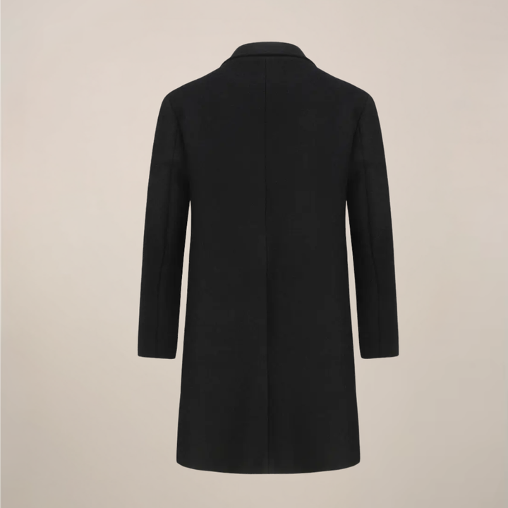 Stylish men's black tailored overcoat. A long double-breasted coat for smart casual or formal winter fashion.