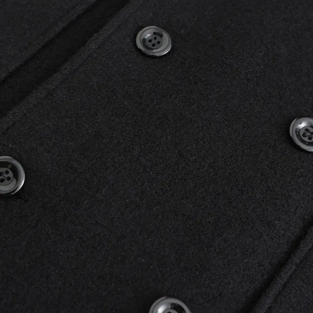 Classic men's black double-breasted winter coat. Tailored long overcoat for sophisticated men's fashion & outerwear.