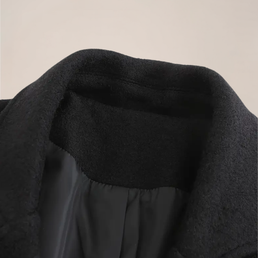 Timeless men's black double-breasted overcoat. Warm long winter coat, ideal for business, formal, or smart casual wear.