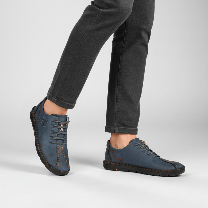 Blue men's orthopedic leather sneakers with ergonomic design, providing comfort & support for everyday wear.