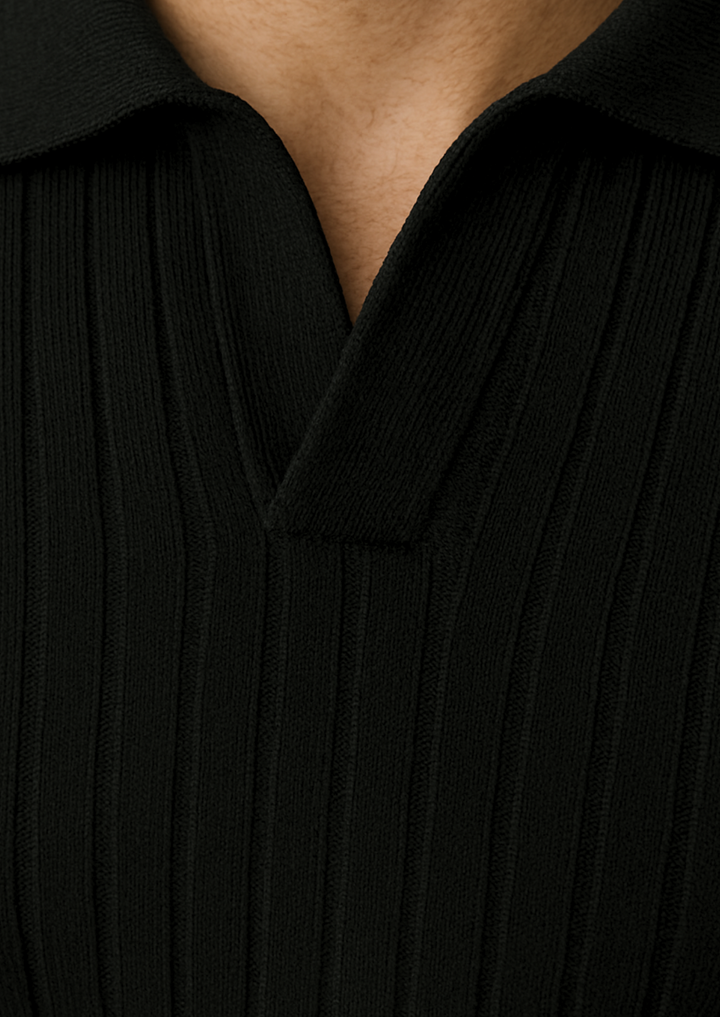 Modern men's black ribbed polo sweater with an open collar, perfect for sophisticated casual outfits.