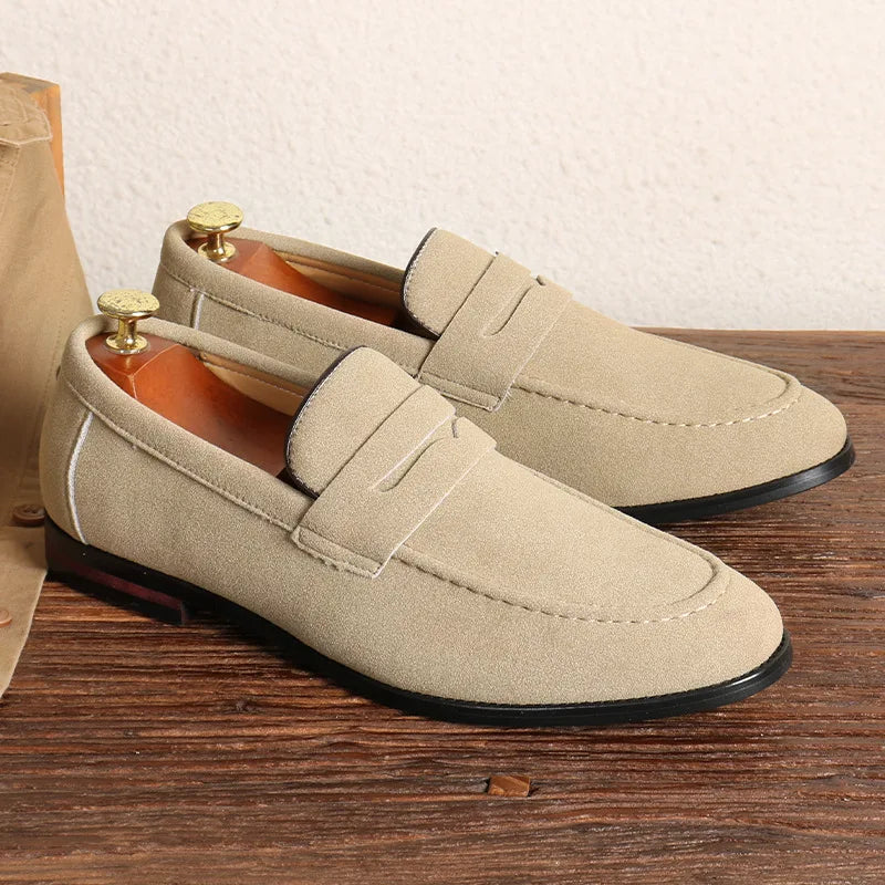 Men's black slip-on loafers, classic style, comfortable casual footwear for versatile wear.