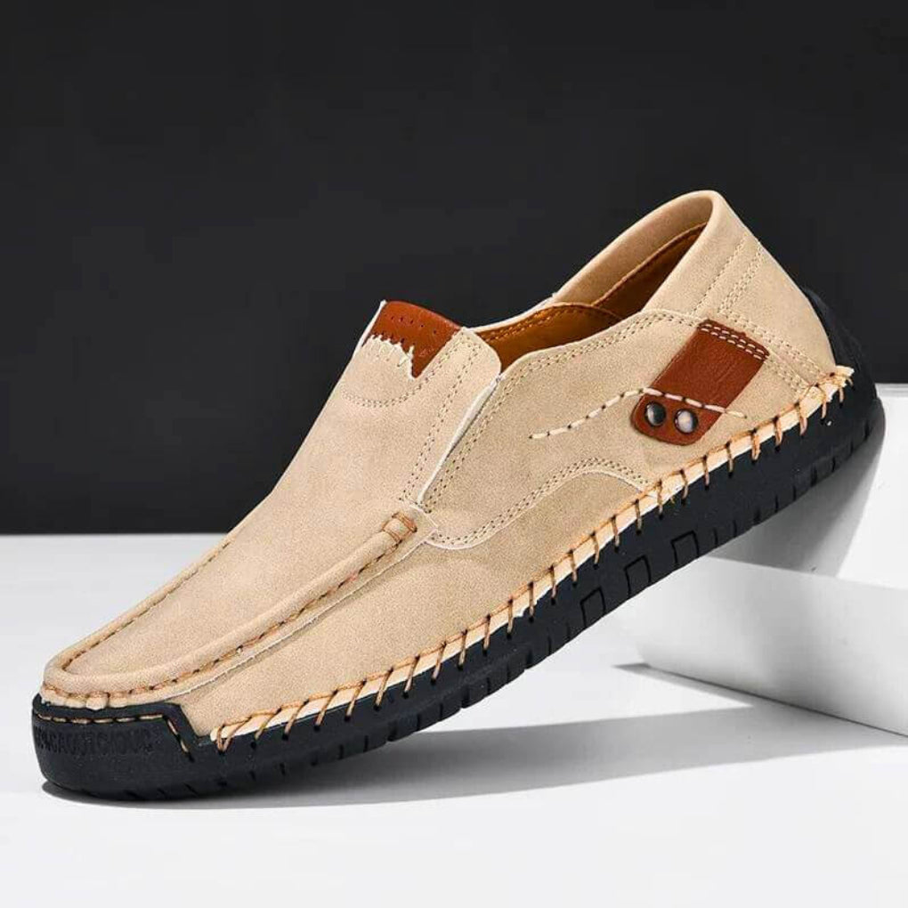 Men's black slip-on shoes with arch support for comfortable daily wear and easy walking.