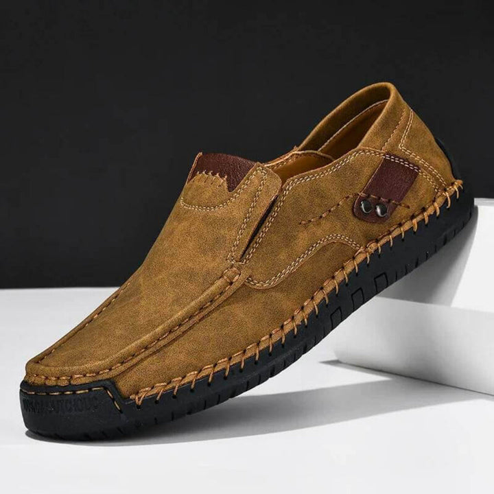 Supportive men's slip-on loafers, engineered for arch support and all-day comfort, ideal for daily relief.