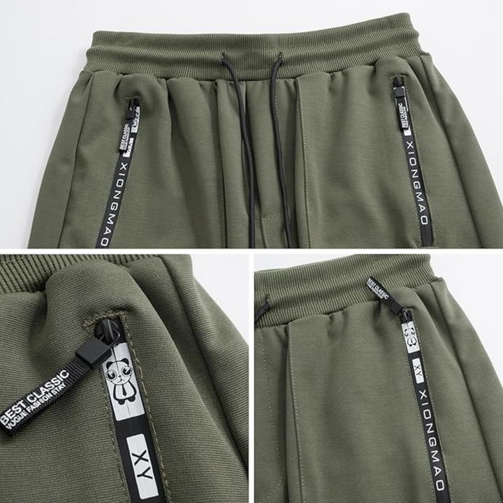 Relaxed fit men's black cargo joggers, versatile for streetwear or casual wear, featuring multiple pockets.