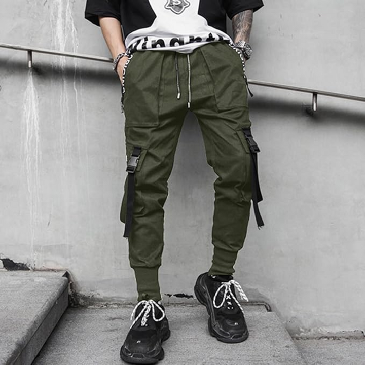 Men's black tactical streetwear joggers, comfortable and multi-pocket, perfect for urban techwear.