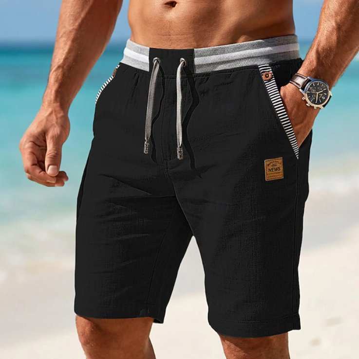 Relaxed fit men's white drawstring summer shorts, comfortable for warm weather, beach & everyday style.