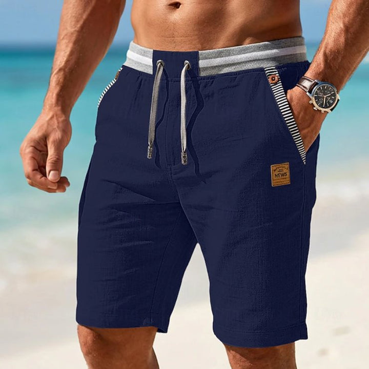 Men's green elastic waist drawstring shorts, offering comfort and style for summer casual & vacation.