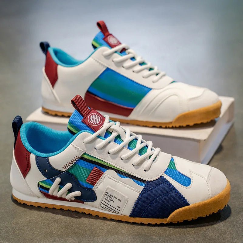 Men's fashion blue, gray, yellow patchwork sneakers. Durable multi-terrain utility shoes for trail & street.