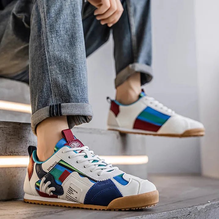 Men's multi-terrain active sneakers. Patchwork blue, gray & yellow design, offering comfort & style.