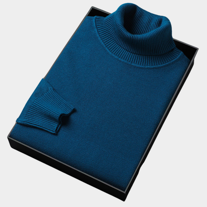 Confident men's turtleneck sweater, offering elegant style and warmth for modern, cool weather layering.