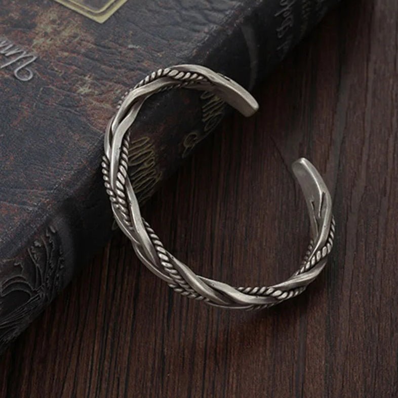 Elegant men's braided sterling silver bracelet, oxidized finish, adjustable and comfortable fit.