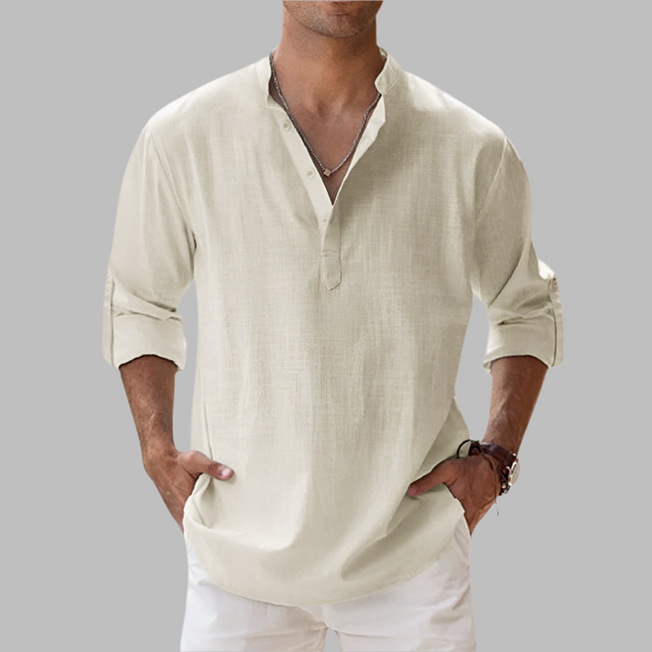 Relaxed fit men's band collar long sleeve shirt. Breathable fabric ensures cool summer style.