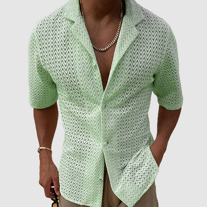 Men's relaxed fit short sleeve button-up shirt with a stylish open-weave texture, perfect for casual summer fashion.