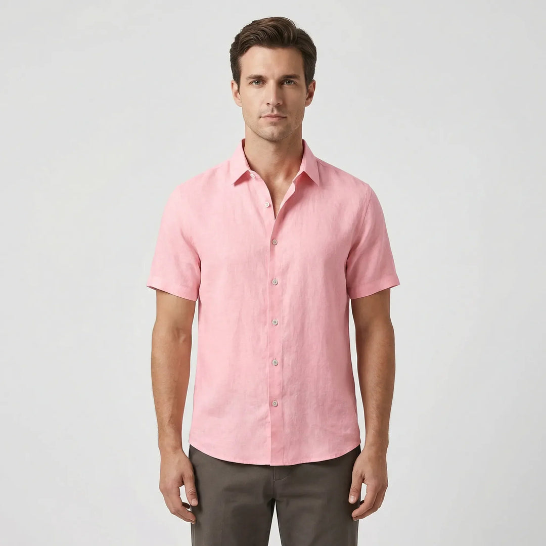 Stylish men's casual short sleeve button-up shirt with a relaxed fit for summer wear.