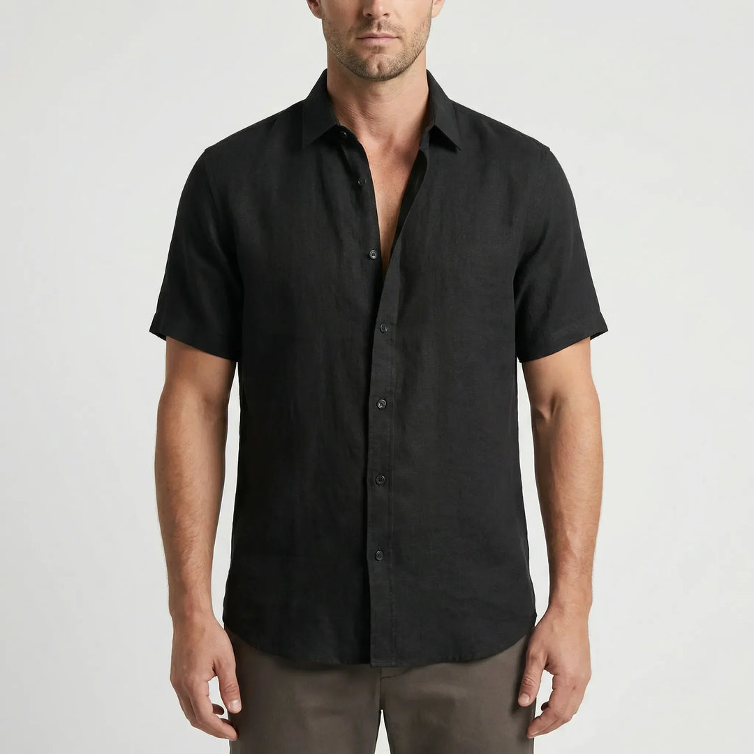 Vacation outfit essential: men's casual button-up shirt, short sleeve, relaxed fit for summer.