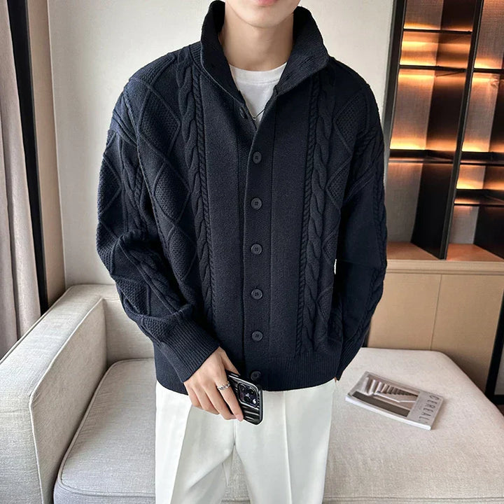 Blue men's cable knit cardigan, a comfortable chunky sweater with button front for versatile, all-season layering.