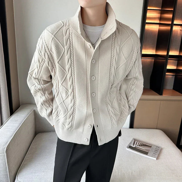 Beige men's cable knit cardigan, a stylish chunky knit sweater with button front, ideal for men's fashion layering.