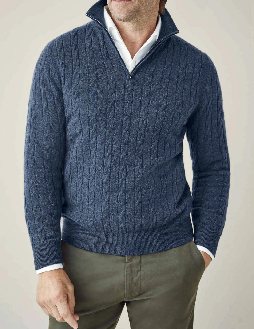 Men's cable-knit quarter-zip sweater, classic style for warmth and comfort.