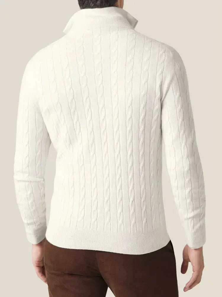 Warm men's cable-knit quarter-zip sweater, essential winter wear for comfort.