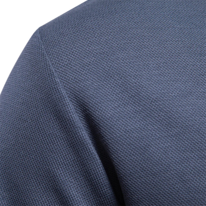 Comfortable men's long-sleeve polo shirt, turn-down collar style, suitable for office and casual wear.