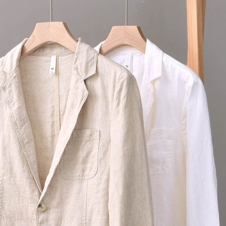 Men's two-button casual blazer in a classic white. Notched lapel, offering smart-casual style & ultimate comfort.