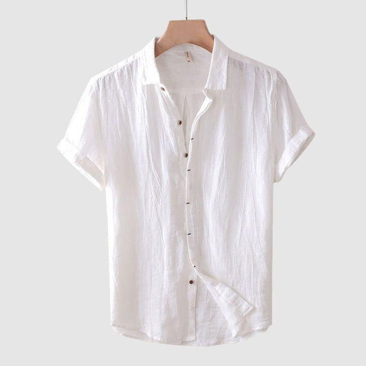 Stylish men's short sleeve button-down shirt with crinkle texture, great for casual summer wear.