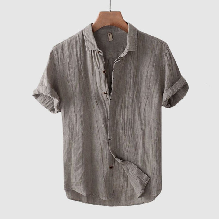 Relaxed fit men's crinkle button-down shirt, short sleeve, lightweight & stylish for summer.