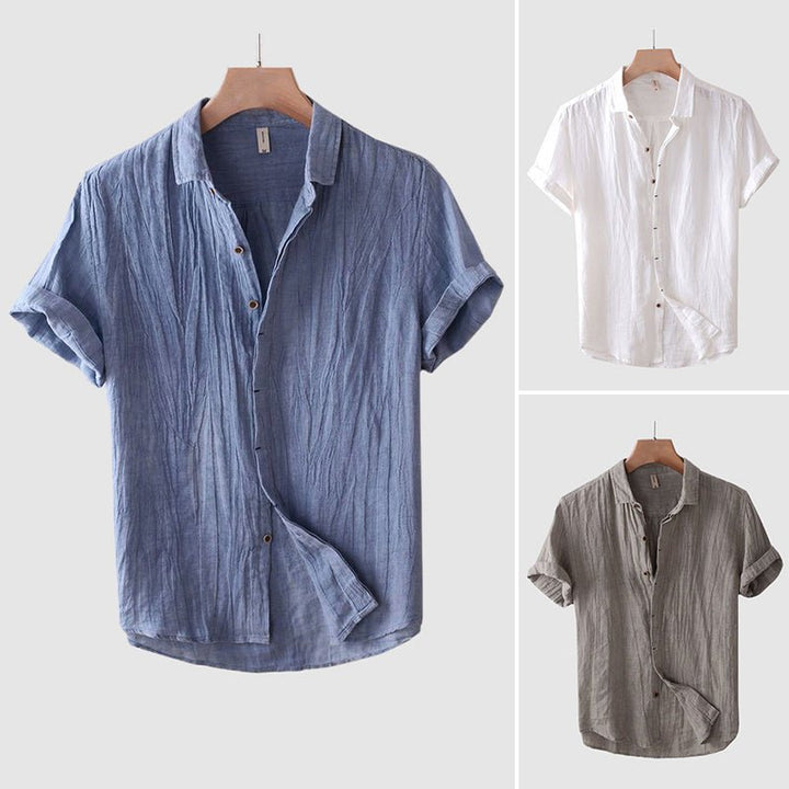 Men's comfortable relaxed fit short sleeve crinkle button-down shirt, perfect for casual summer style.
