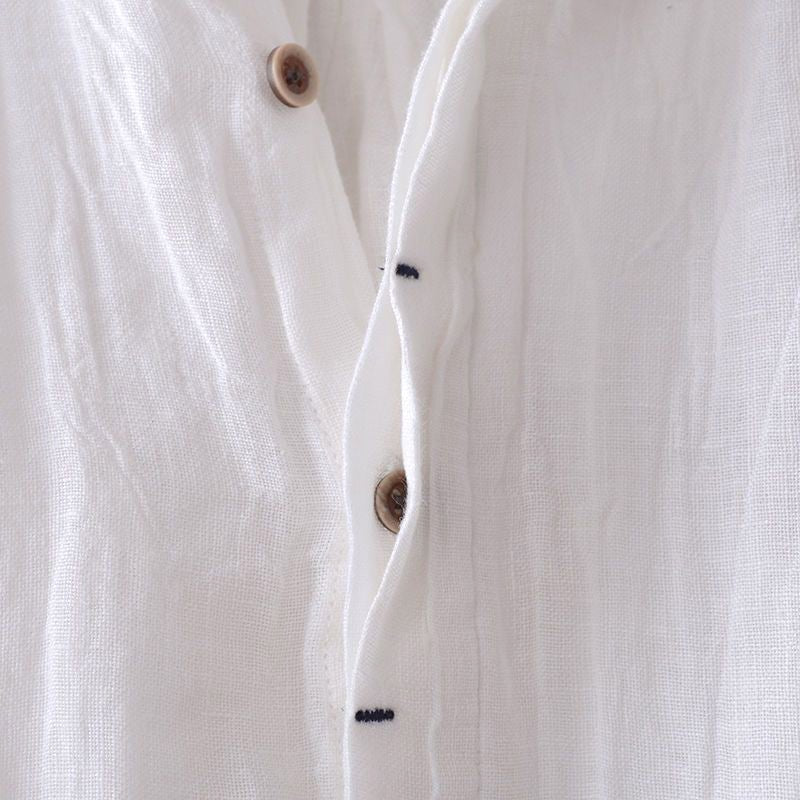 Versatile men's short sleeve crinkle button-down shirt, stylish & casual for warm weather summer days.