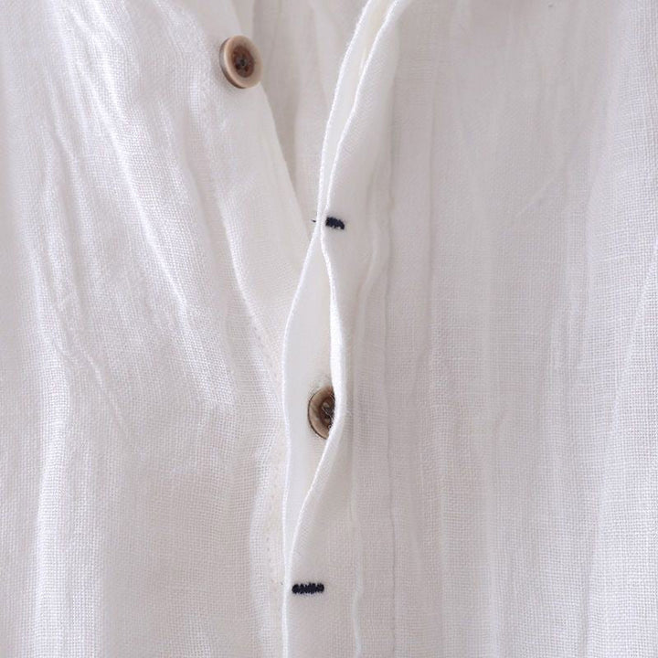 Versatile men's short sleeve crinkle button-down shirt, stylish & casual for warm weather summer days.