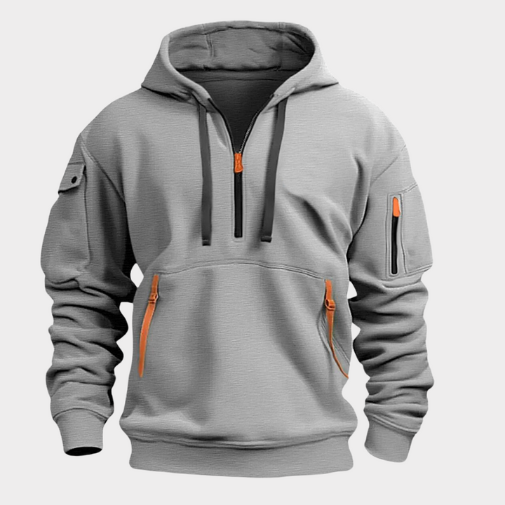 Men's casual half-zip hoodie, Diego model, featuring secure zippered pockets for everyday urban style.