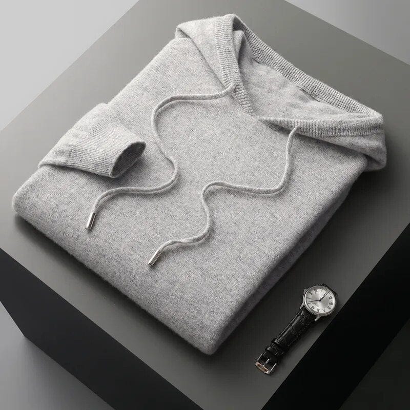 Men's long sleeve knit hoodie sweater featuring a practical drawstring hood. Ideal comfortable pullover for casual style.