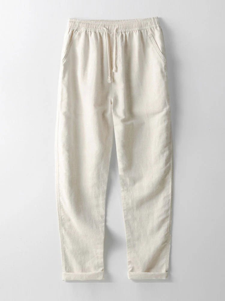Men's comfortable two-piece set: casual shirt & pants with rolled cuffs. Relaxed for summer.
