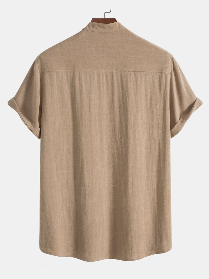 Enjoy summer in this men's casual shirt & pants set with rolled cuffs. Breathable, stylish vacation outfit.