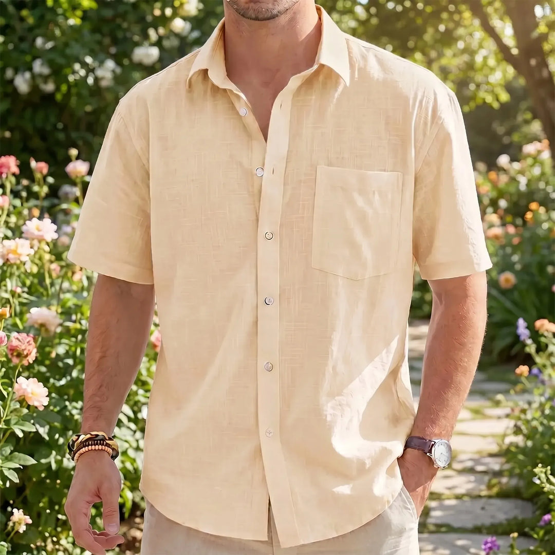 Men's casual short-sleeve button-up shirt in a relaxed fit, perfect for summer fashion & warm weather.