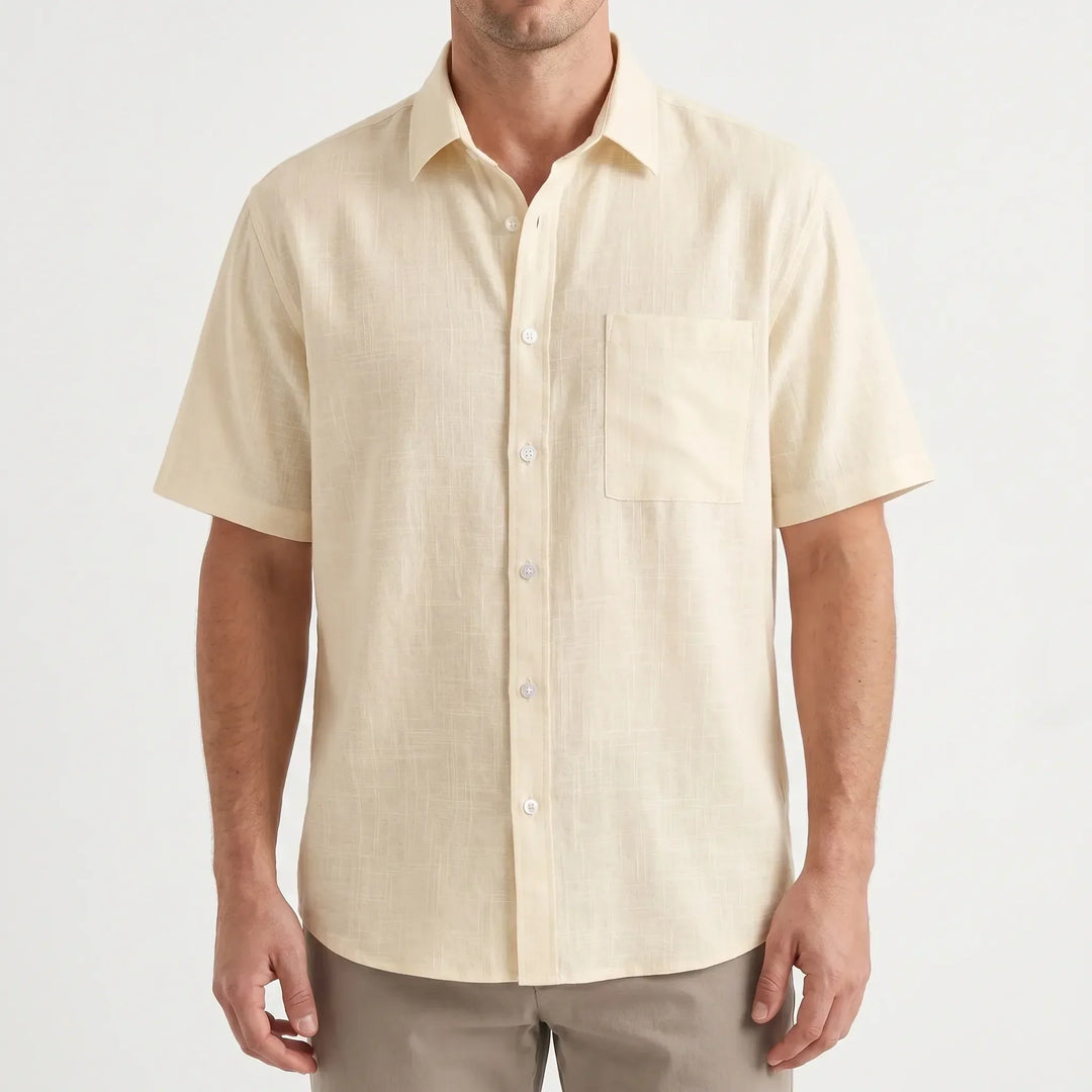 Versatile men's short-sleeve button-up shirt for casual wear, ideal for vacation style & daytime leisure.